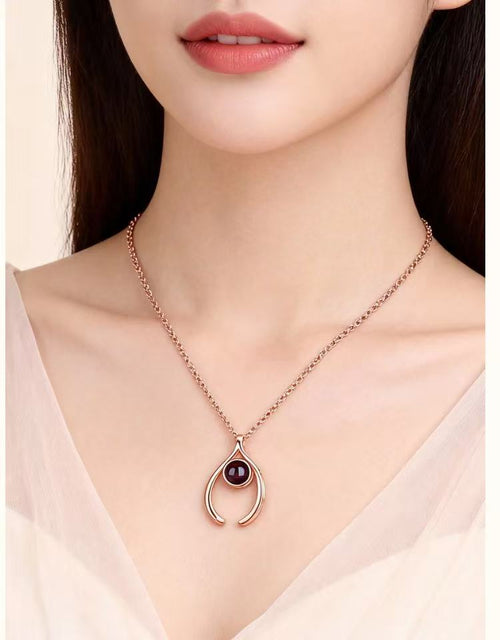 crescent-moon-hug-photo-projection-necklace-rose-gold-worn